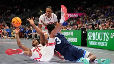 Big 12 replacing unsafe glass floor with hardwood for remaining tournament